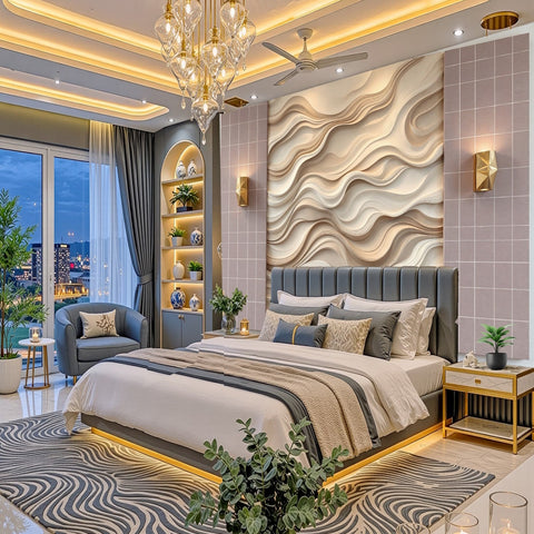 A luxury modern bedroom featuring a large bed with gray tufted bedding, a patterned gray and white rug, a gold chandelier, and a textured beige and white wavy wall panel behind the bed.